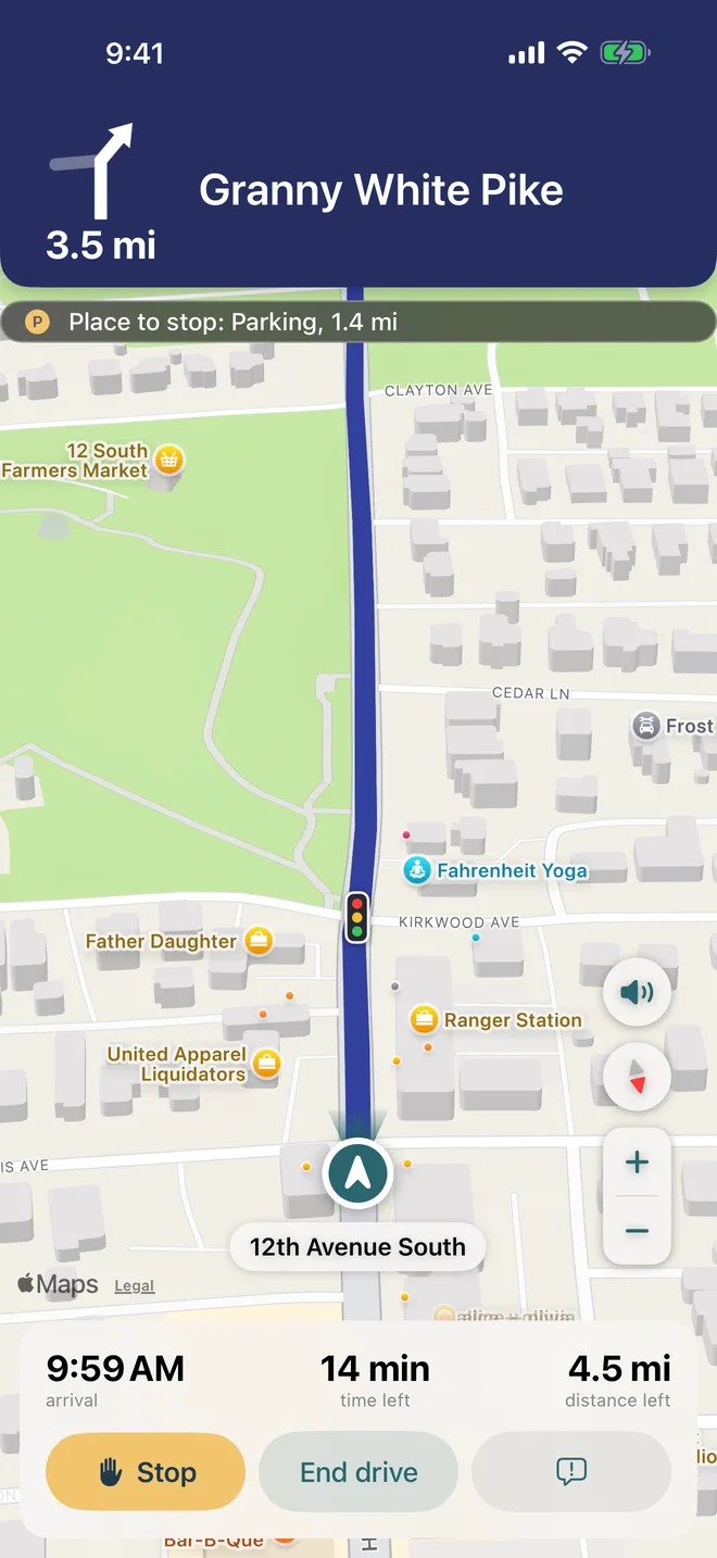 A drive under way: the next turn, the road ahead and the Stop button.